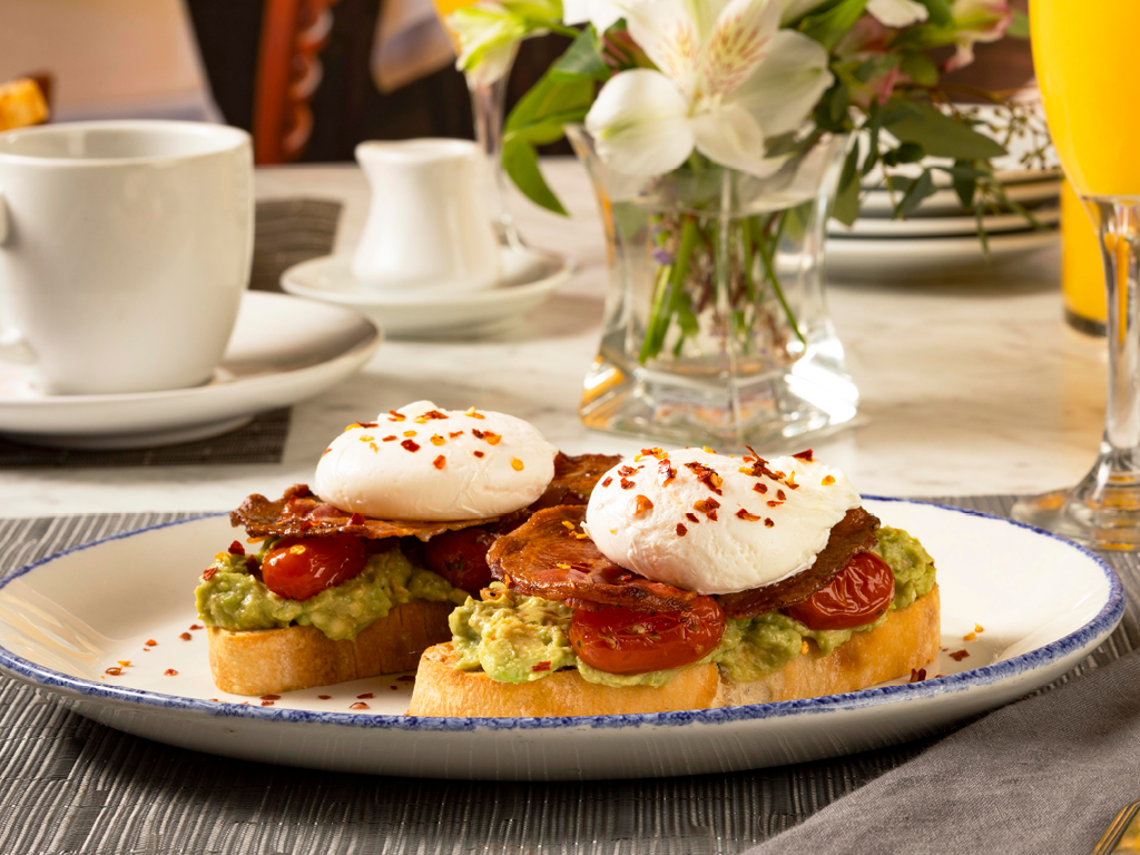 Brio's avocado toast on decorated table from a bridal luncheon